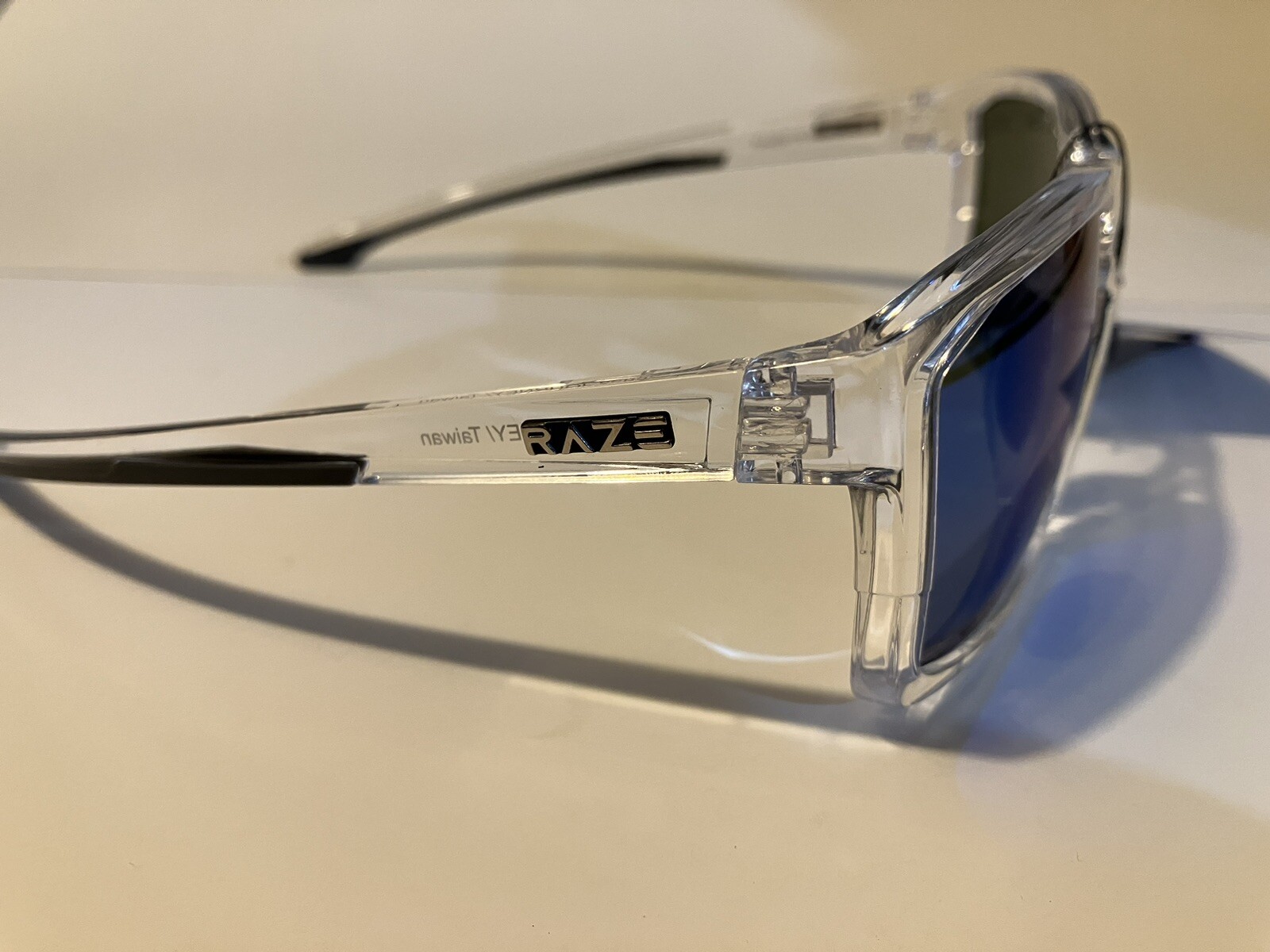 RAZE Eyewear Sunglasses Journey mirrored blue lens clear frame 26922