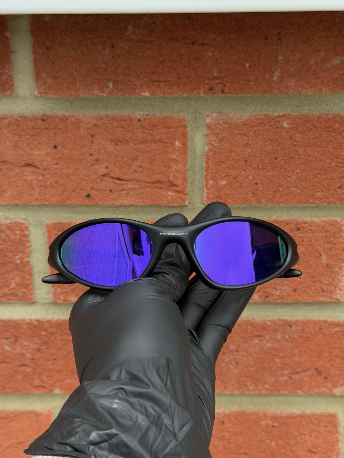 Retro Oakley Minute 1.0 Polarized Sunglasses Black Frame Purple Lenses