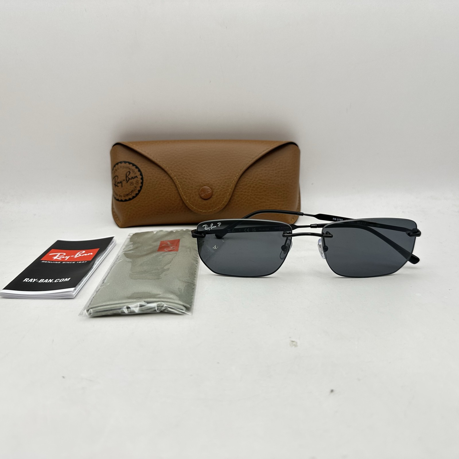 Ray Ban Mens Rimless Irregular Thin Metal Polarized Sunglasses RB3768 Black/Gray
