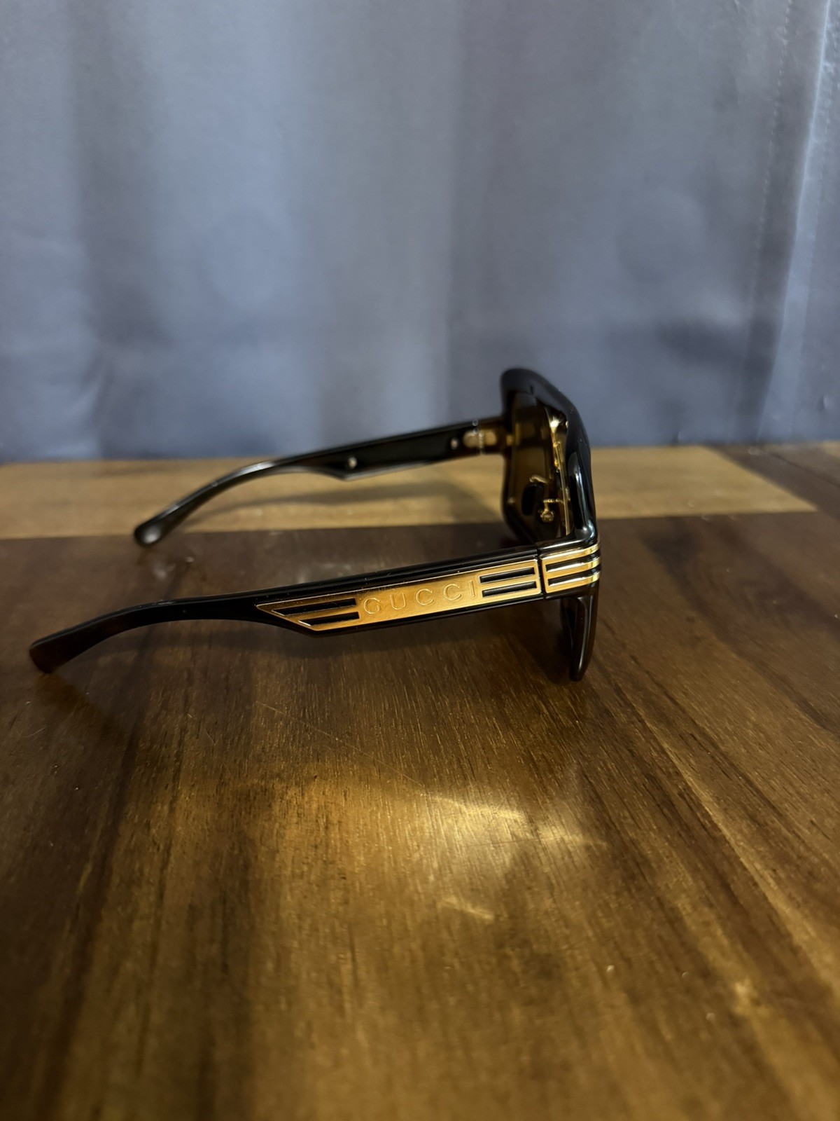 Gucci GG0900S Shield Sunglasses – Brown & Gold oversized fit