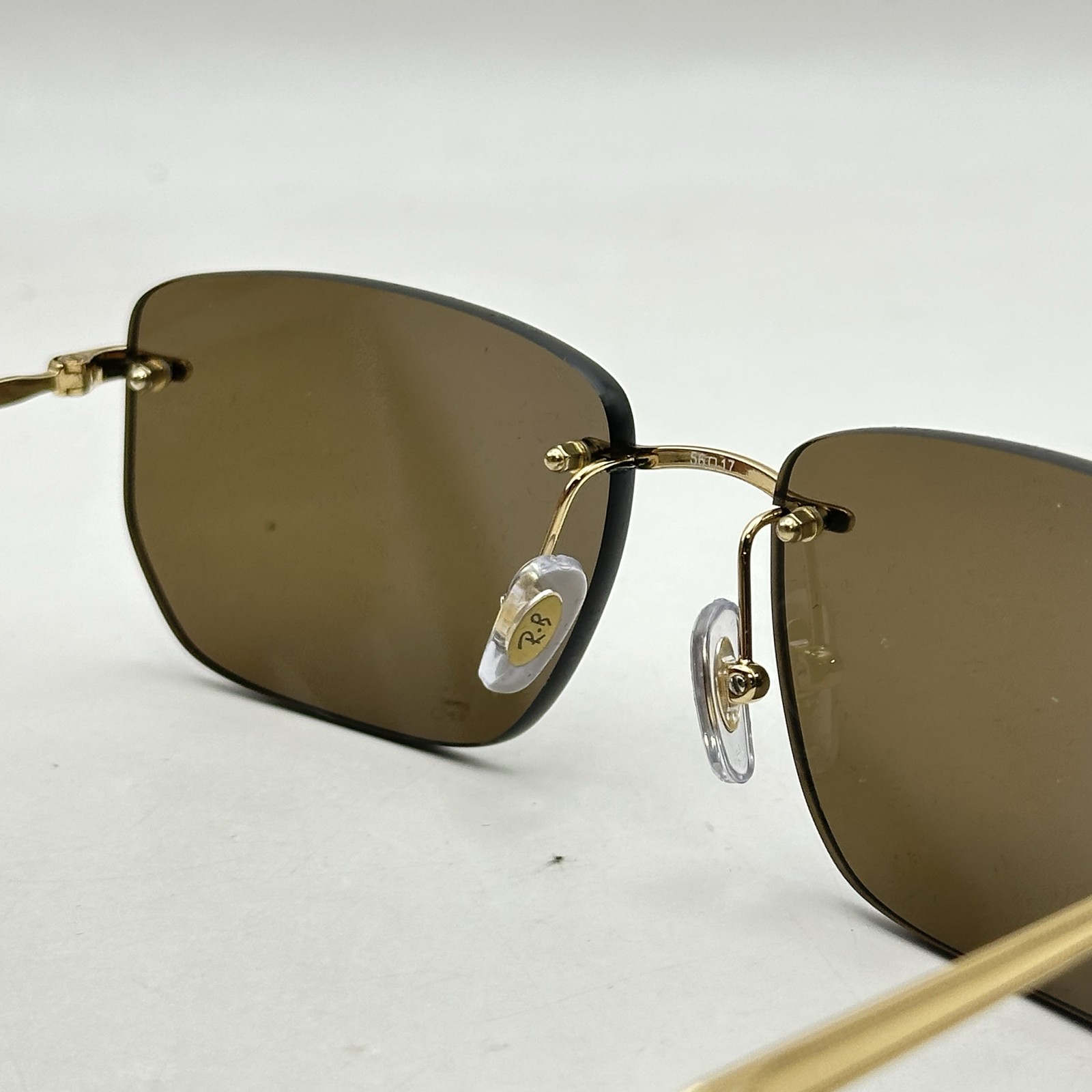 Ray Ban Mens Rimless Irregular Thin Metal Sunglasses RB3768 Gold/Dark Brown