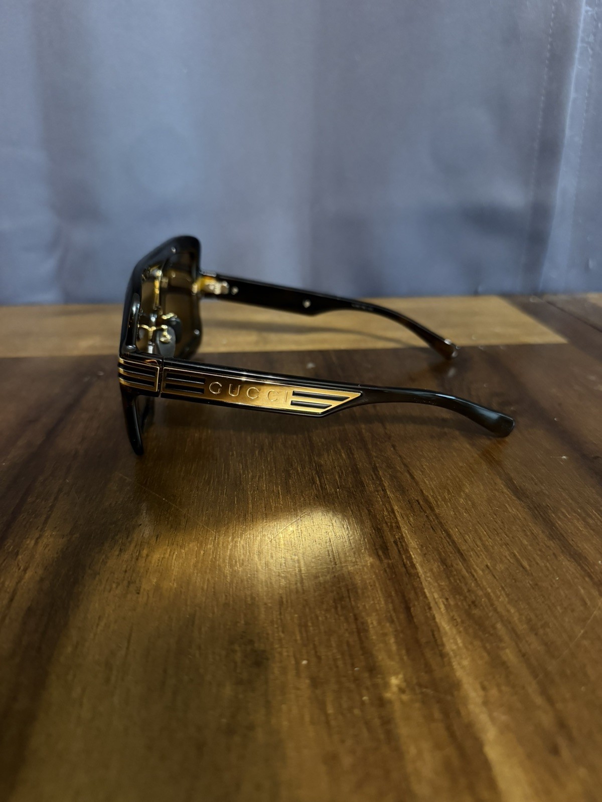 Gucci GG0900S Shield Sunglasses – Brown & Gold oversized fit