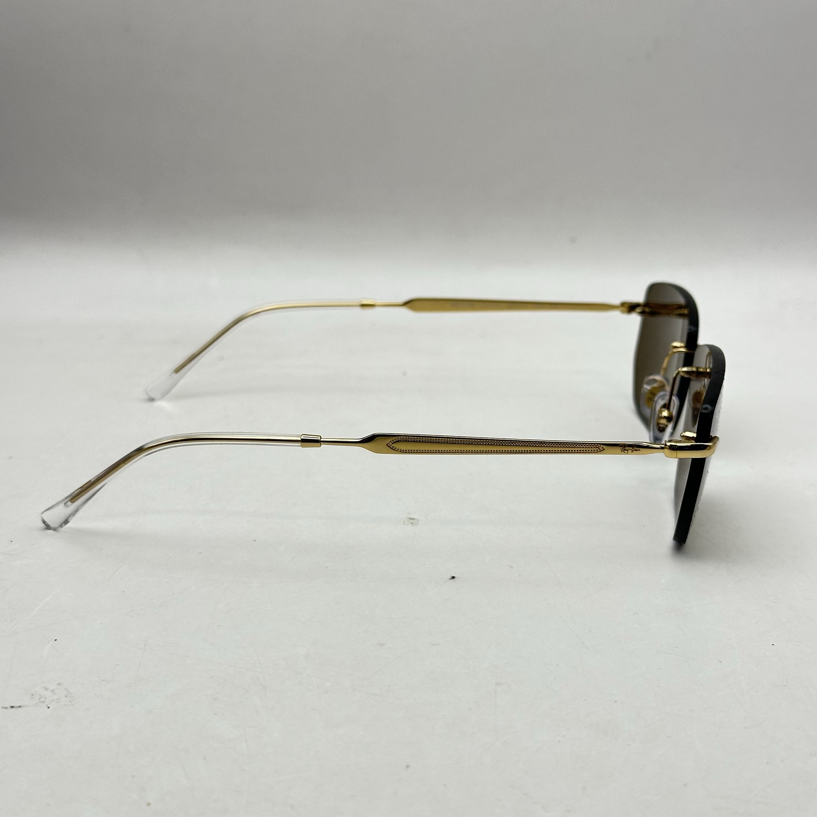 Ray Ban Mens Rimless Irregular Thin Metal Sunglasses RB3768 Gold/Dark Brown