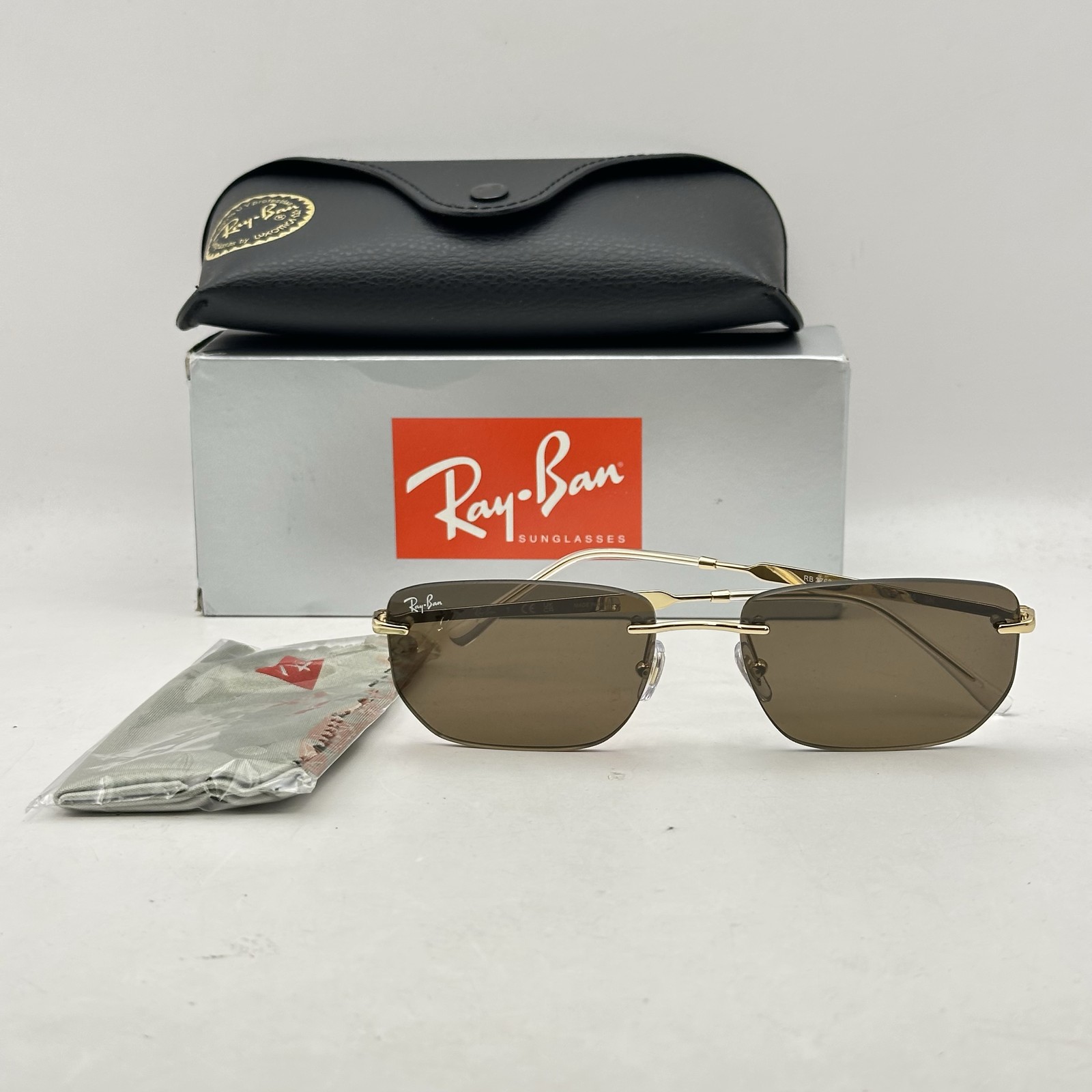 Ray Ban Mens Rimless Irregular Thin Metal Sunglasses RB3768 Gold/Dark Brown