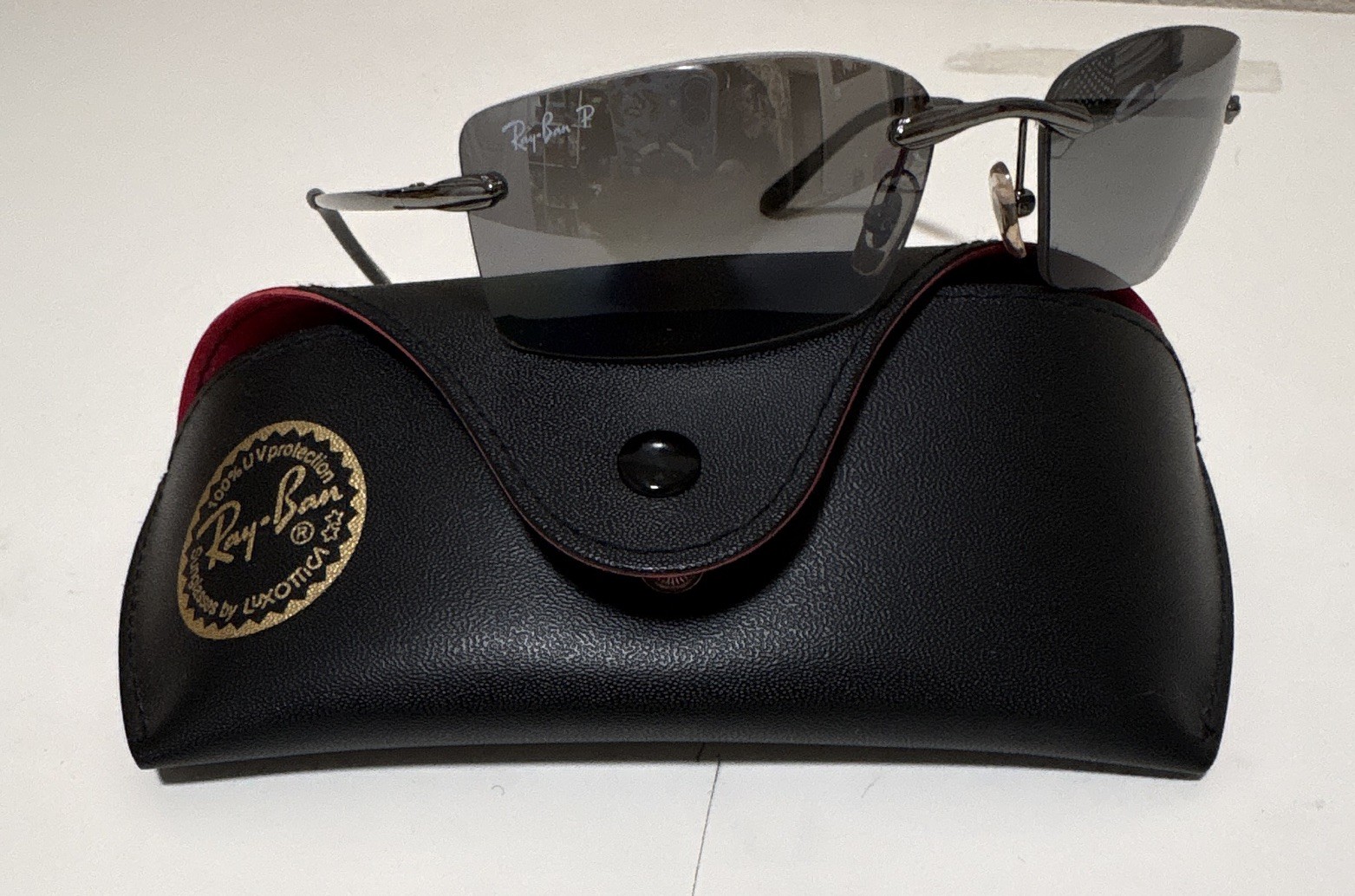 Ray-Ban Ladies Polarized Rimless Sunglasses Gray Glass Lenses Silver Metal Case