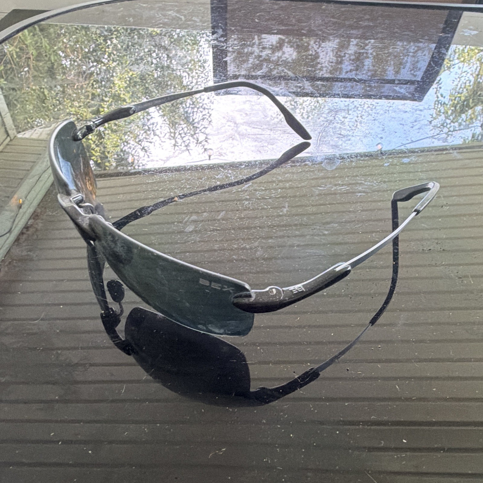 BEX Lightweight Rimless Wrap Sunglasses Silver Metal Frame Black Mirrored