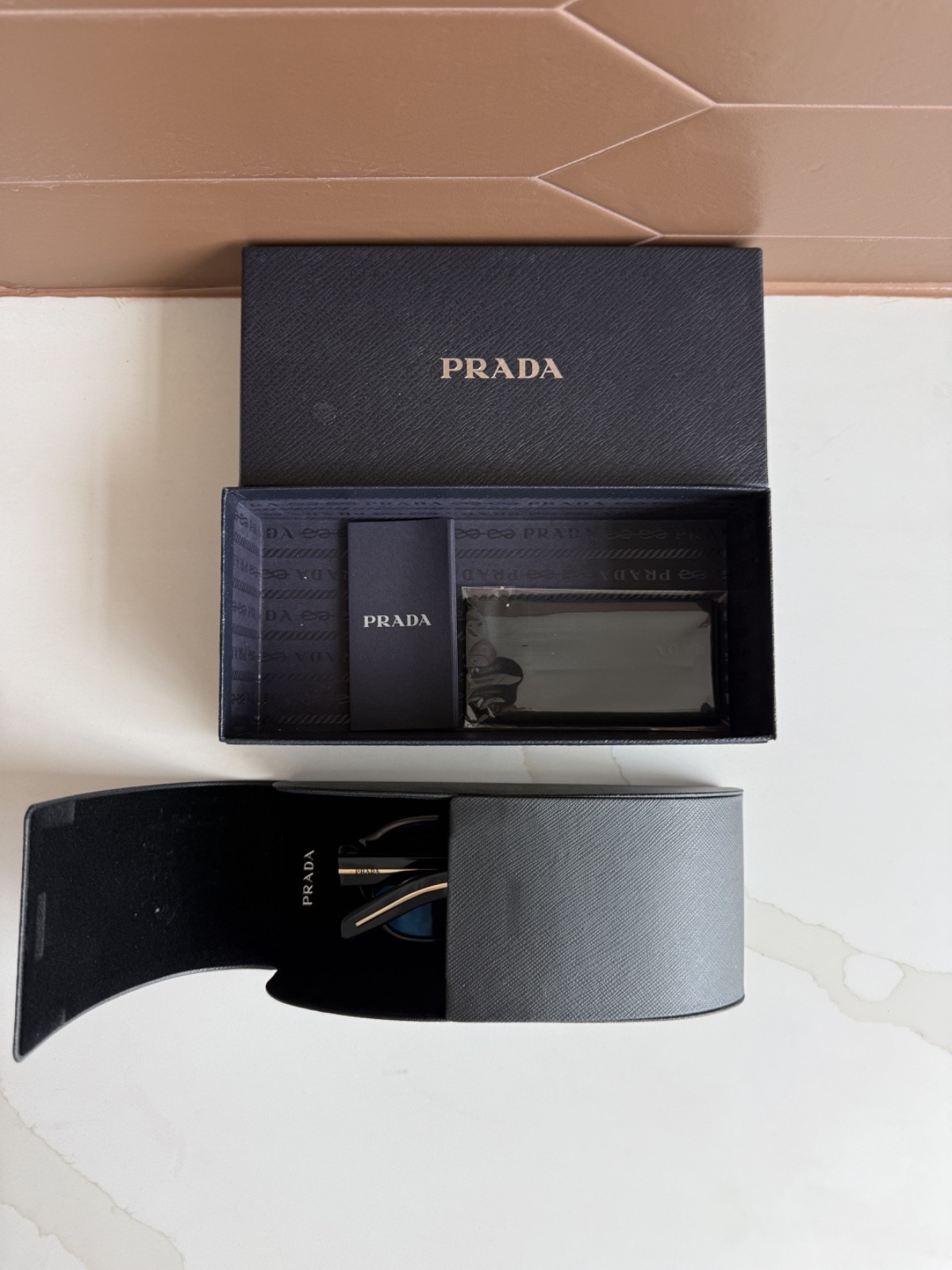 PRADA PR A16S Sunglasses with turquoise blue lenses