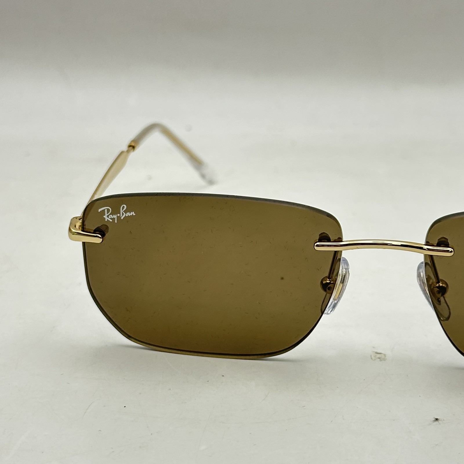 Ray Ban Mens Rimless Irregular Thin Metal Sunglasses RB3768 Gold/Dark Brown