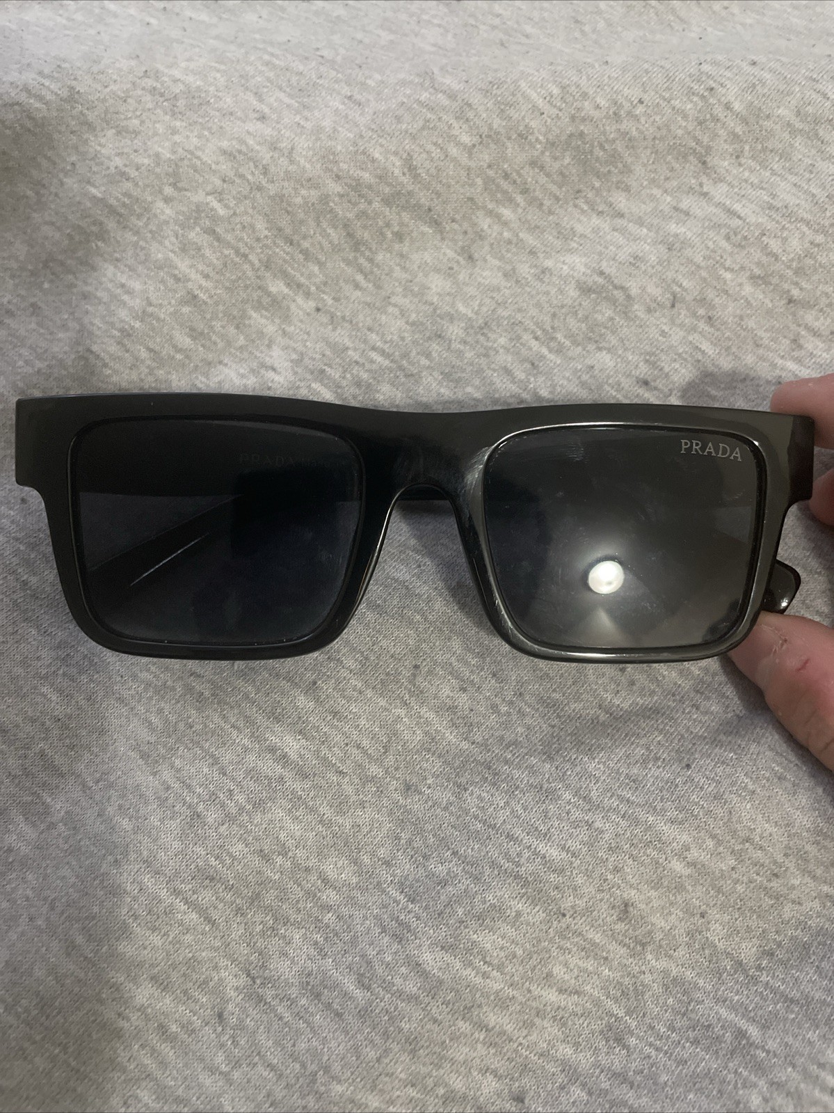 PRADA PR 27ZS Men’s Irregular Sunglasses – Black/Gray (PR 27ZS 16K08Z 54)