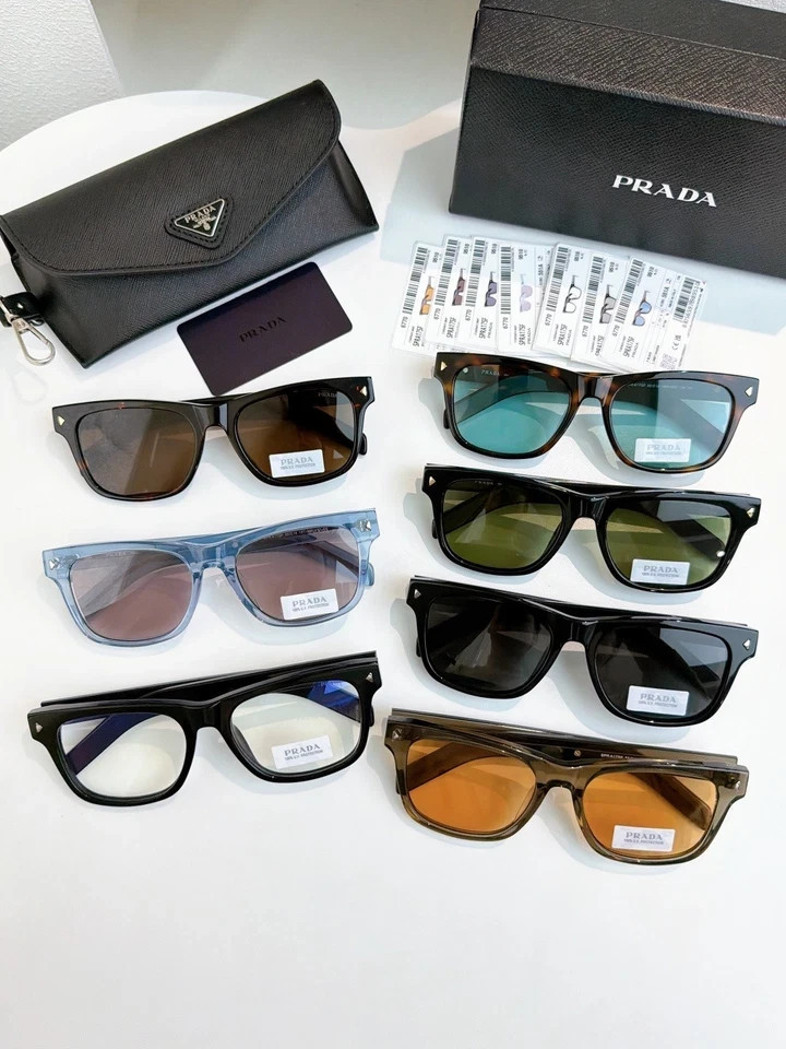 PRADA SPRA17SF Unisex Sunglasses Transparent Ice‑Blue Frame Dusty Pink Lens 55MM