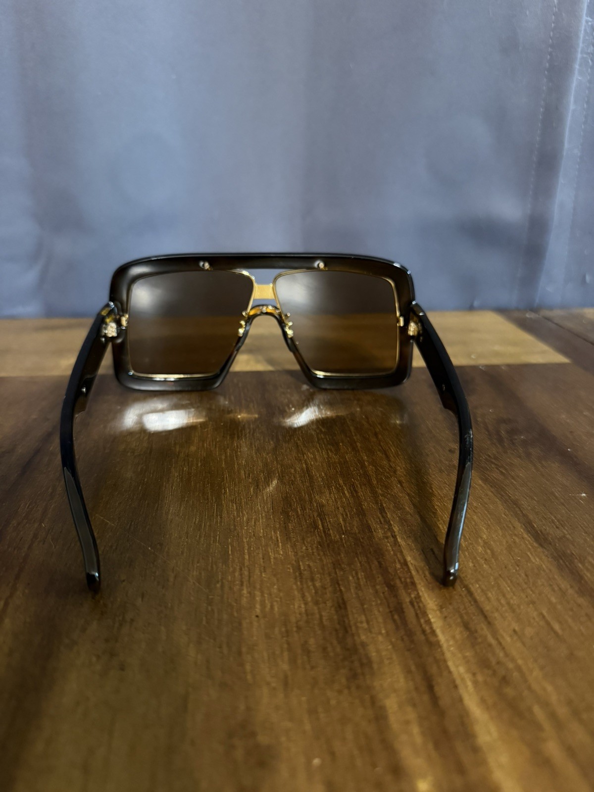Gucci GG0900S Shield Sunglasses – Brown & Gold oversized fit