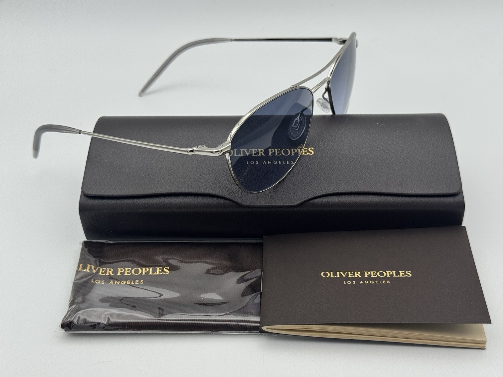 Oliver Peoples OV1358S 5036Q8 – AERO II – Silver / Marine Gradient (57MM)