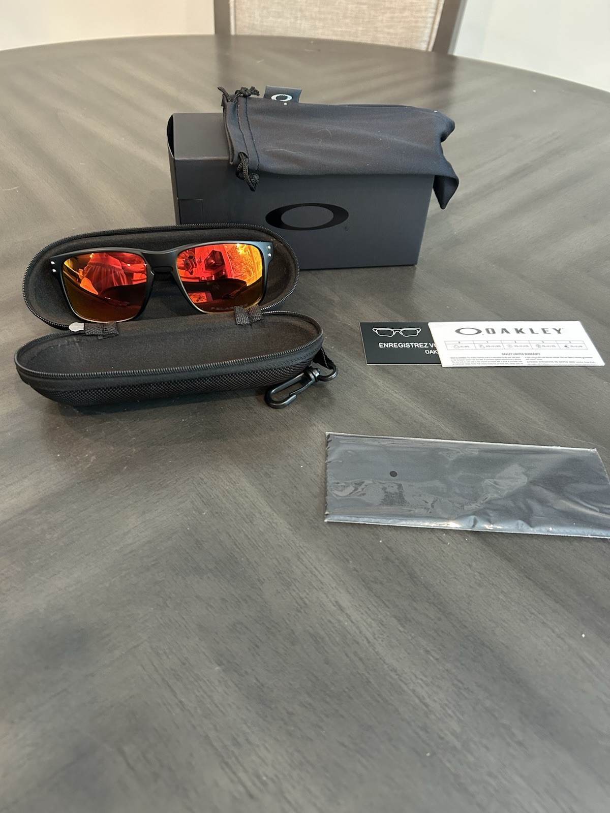 Oakley Holbrook OO9102 Men’s Square Sunglasses Black Plastic Mirrored Red