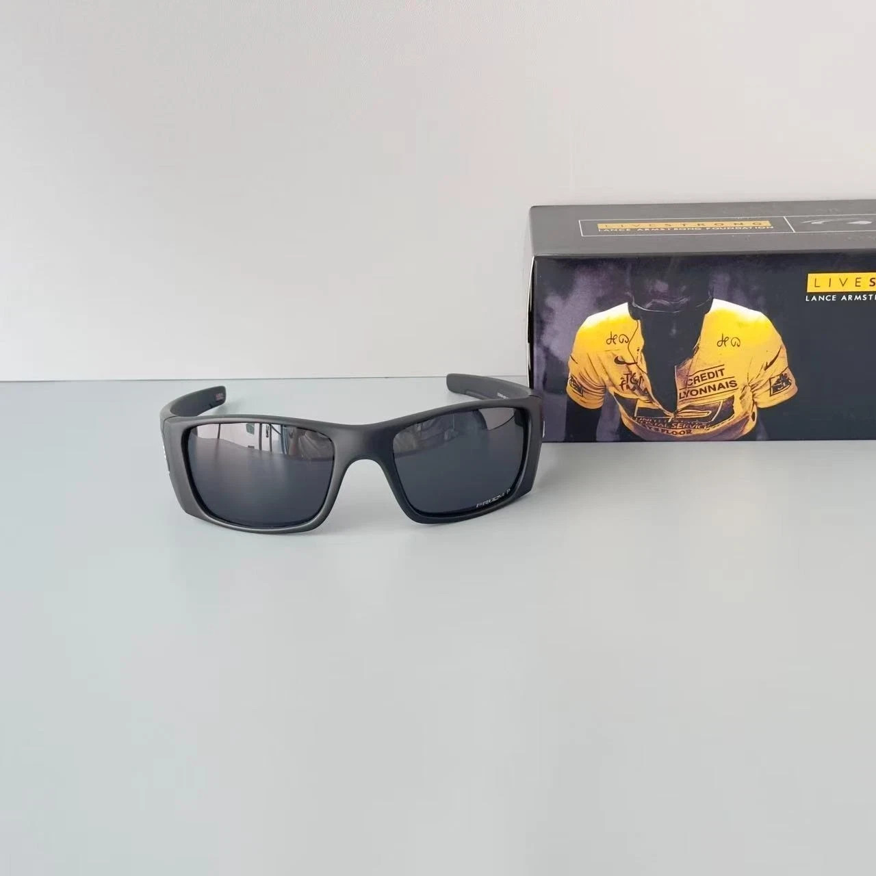 Oakley Fuel Cell OO9096 Polarized Sunglasses Black Frame Black Lens USA Flag